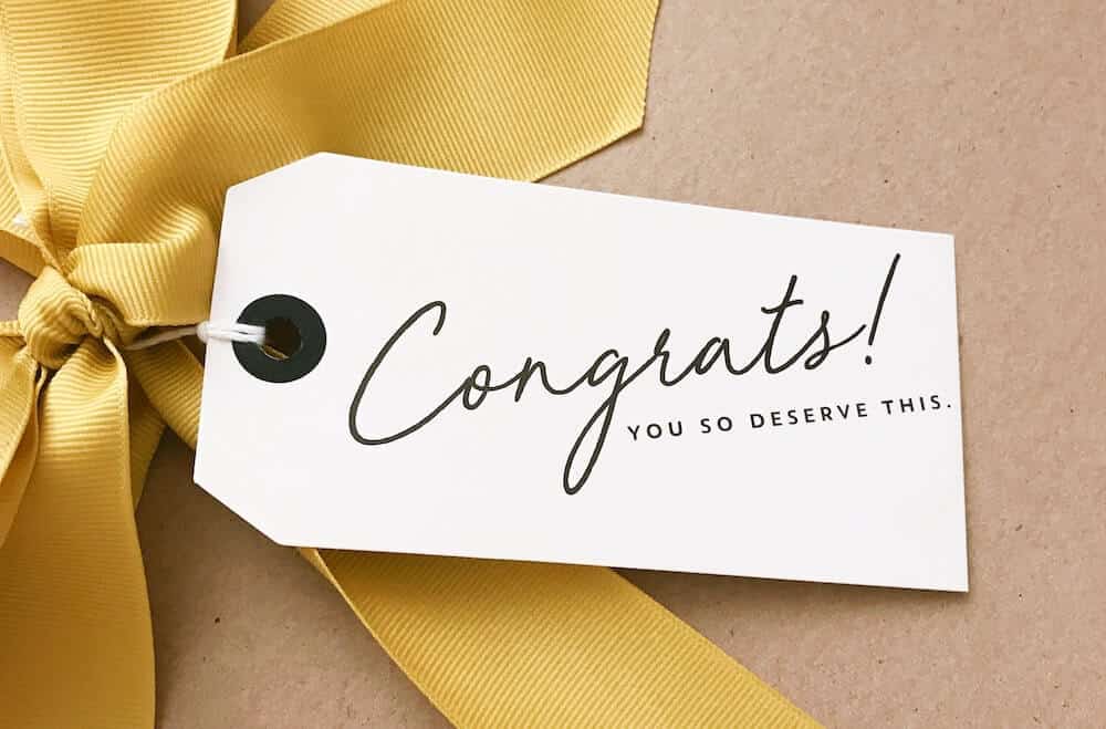 Gift with a card that says: Congrats, you've earned this