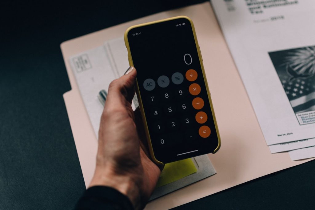 A cleaning business owner sets a budget for his income goals and expenses.