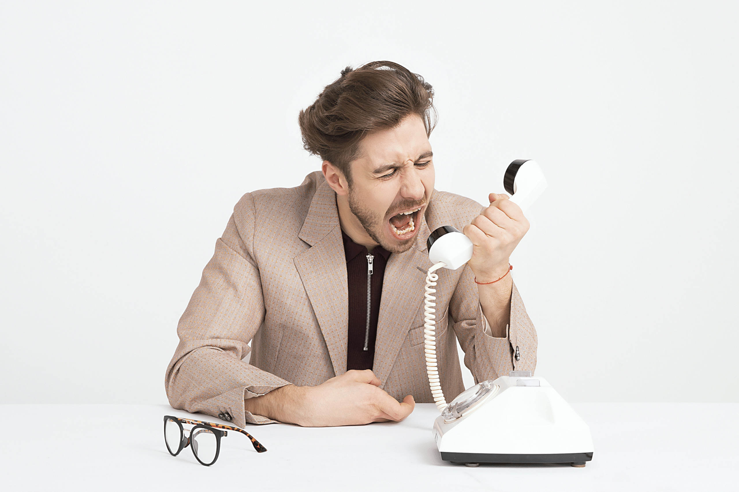 Man yelling into a phone