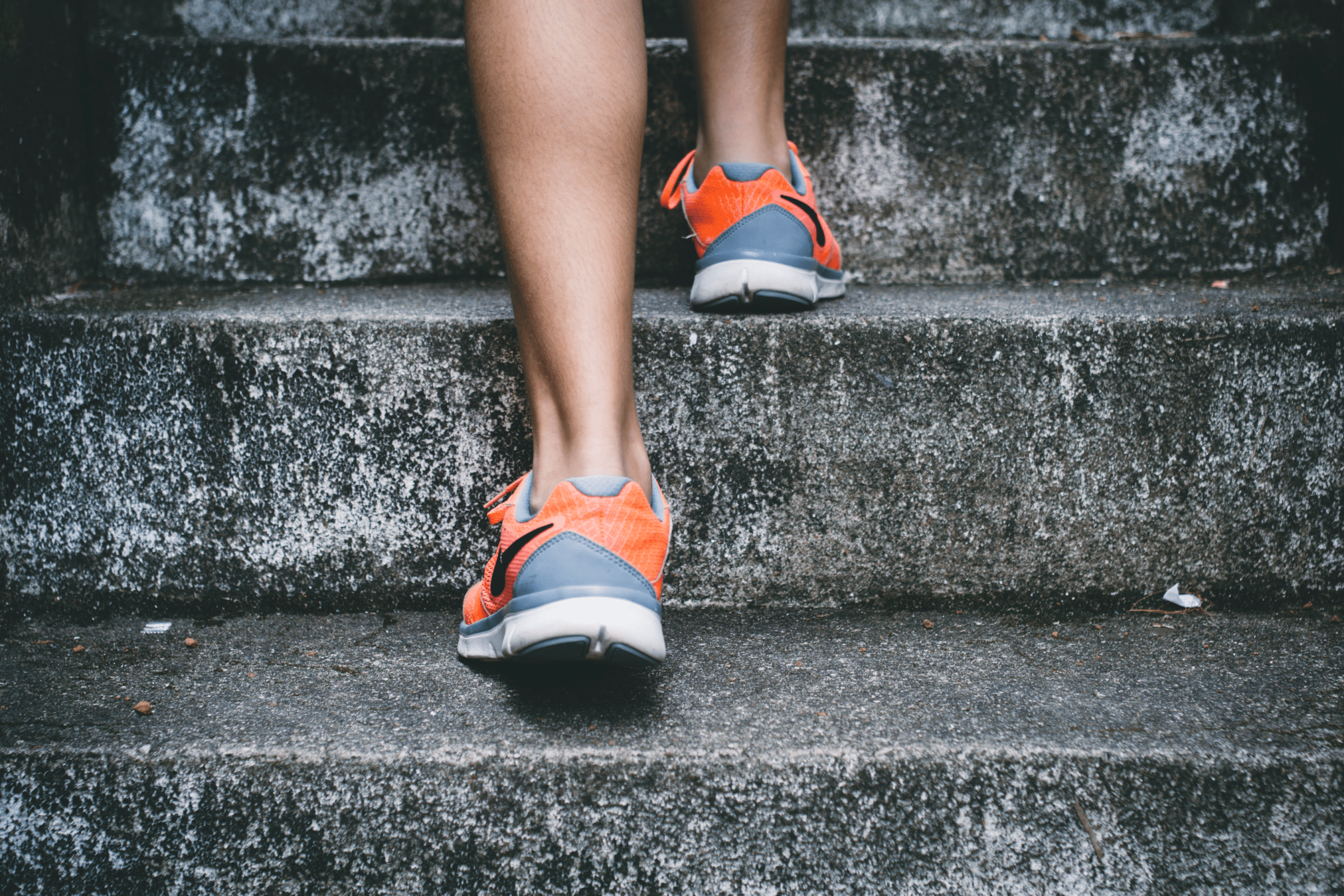 Woman's feet walking up steps